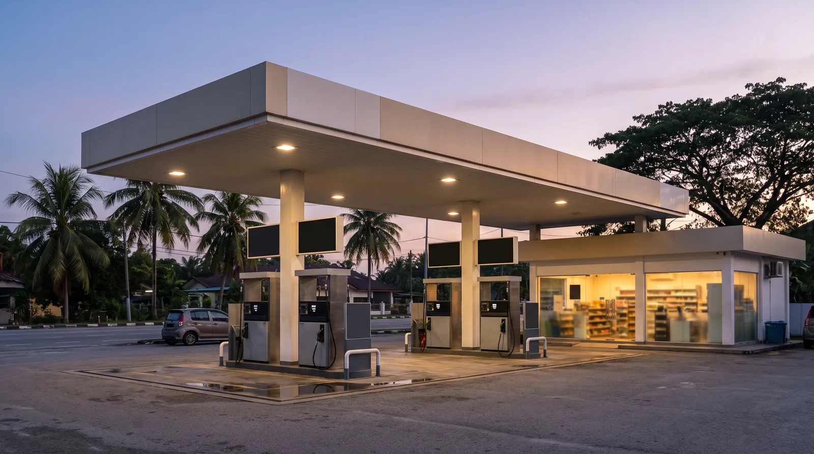 a fuel station forecourt at dusk